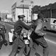 Rev. Martin Luther King, Jr., left, and Rev. Ralph Abernathy, right, are arrested by police during the demonstration in Birmingham.